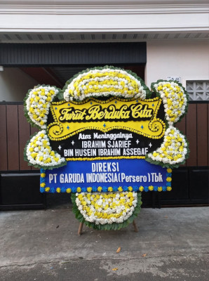 Papan Bunga Duka di Dogomo